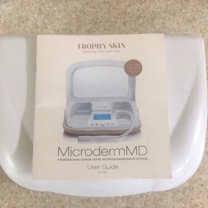Trophy skin microdermabrasion used handful of times still lots of replacements.